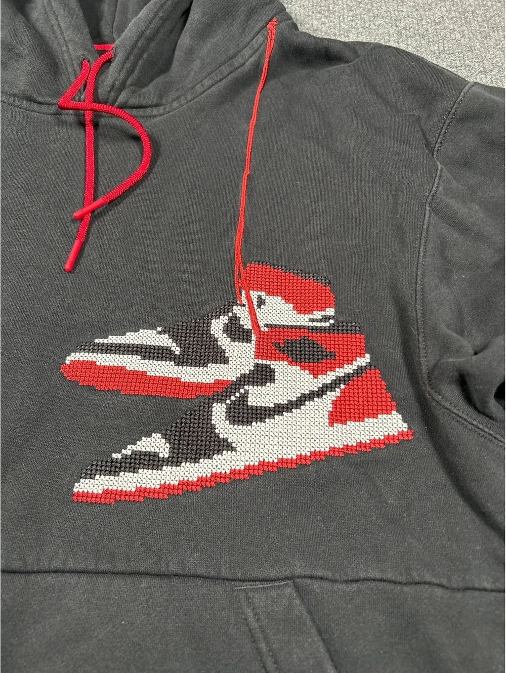 Jordan Black Hoodie with Red and White Sneaker Graphic